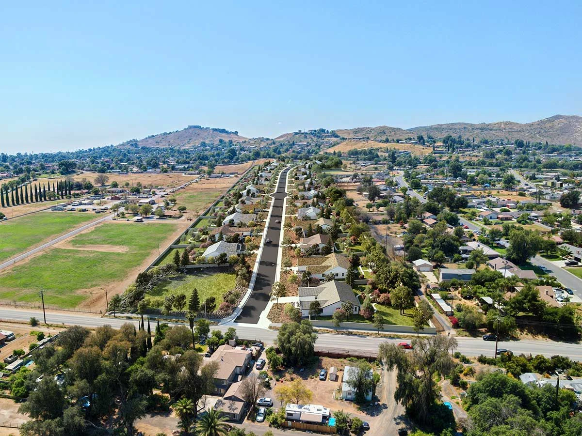Aerial view down a street of RC Hobbs homes, representing the upcoming Bradshaw Collection