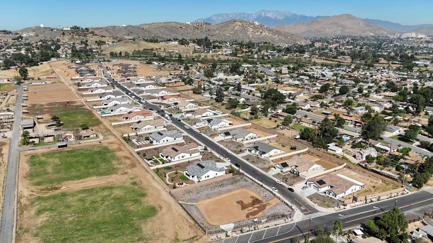 Aerial view of graded land and new streets at an RC Hobbs site before homes are built